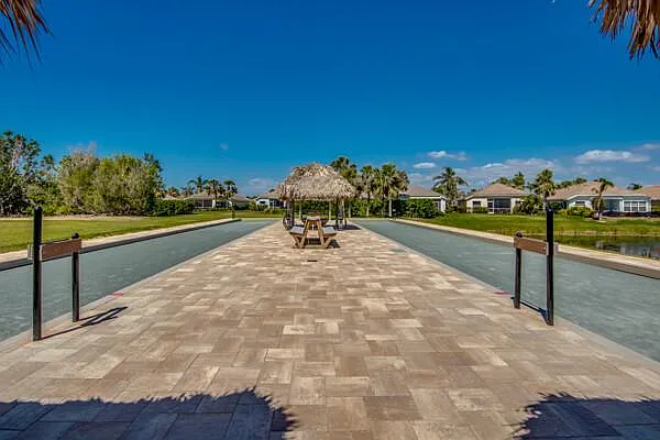 Sandoval bocce and shuffleboard courts with tiki hut shade