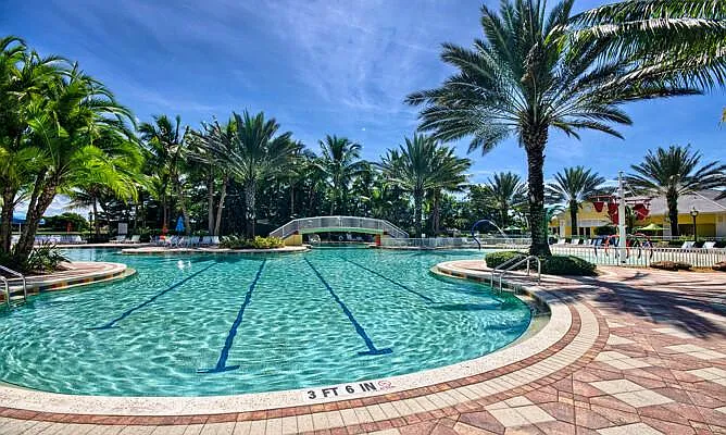Sandoval resort-style pool with palm trees — another angle