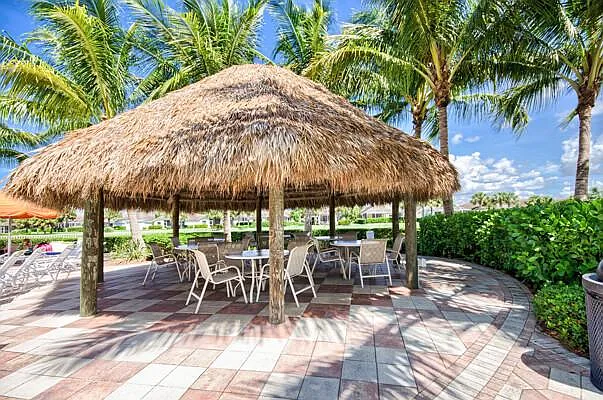 Sandoval community tiki hut outdoor seating area by the pool